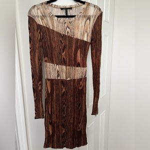 BCBG small midi dress . Form fitting flattering and stretches to comform